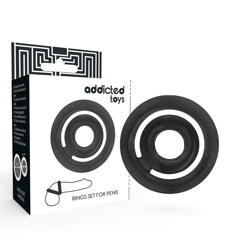The image shows a two-ring set from Addicted Toys designed for the penis, presented alongside its packaging. The rings are black and appear sleek and simple in design.